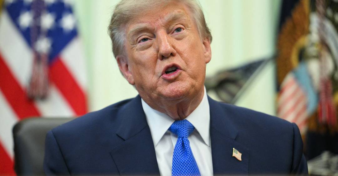 AFP__20260810__C4CJ7RZ__v3__HighRes__UsPresidentDonaldTrumpSignsExecutiveOrderOnVacc